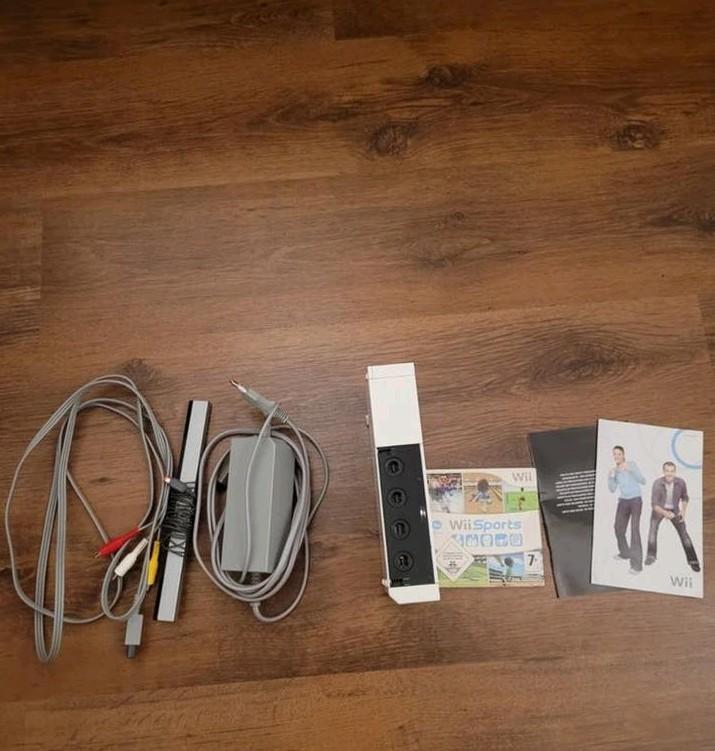 Werkende Wii console met Wii Sports game en alle kabels, Ophalen of Verzenden, Gebruikt, Zonder controller, Met games