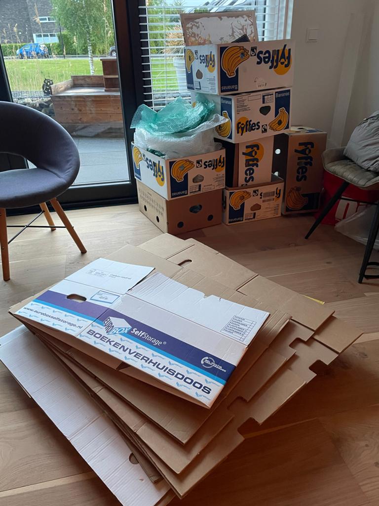 30 verhuisdozen, Ophalen