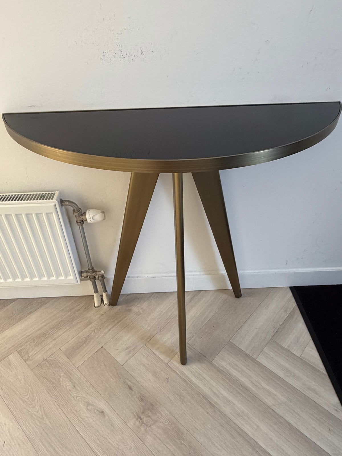Eichholtz Console Tafel Aston - Geborsteld Messing & Zwart G, Huis en Inrichting, Ophalen, 100 tot 150 cm, Overige vormen, 25 tot 50 cm