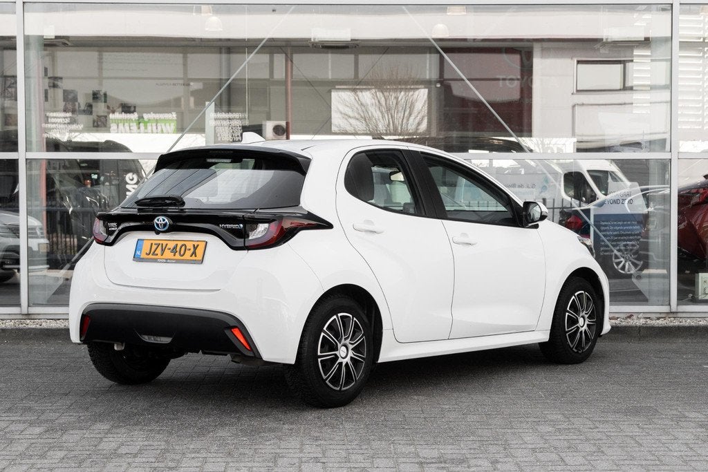 Toyota Yaris 1.5 Hybrid 115 Active, Auto's, Toyota, Gebruikt, Euro 6, Wit, 1490 cc
