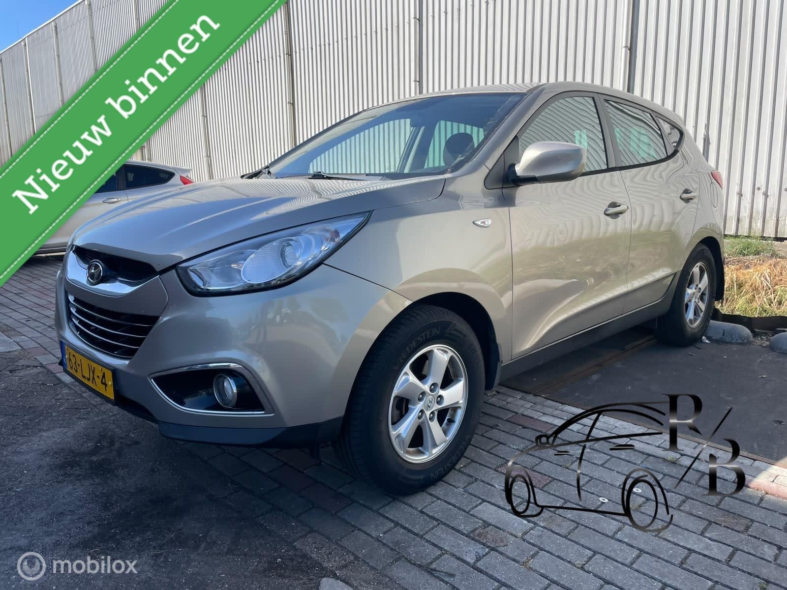 Hyundai ix35 2.0i Dynamic LPG ZEER MOOIE AUTO AIRCO CRUISE, Auto's, Hyundai, Stof, Gebruikt, Zwart, 4 cilinders