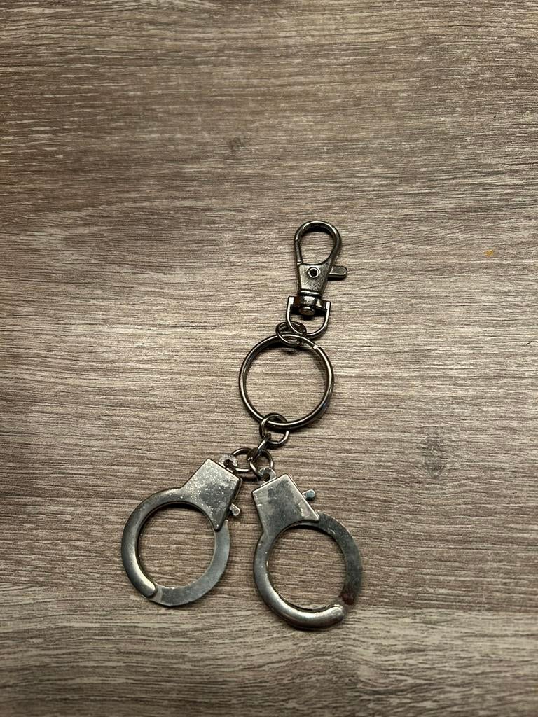 Sleutelhanger handboeien, Ophalen of Verzenden, Zo goed als nieuw