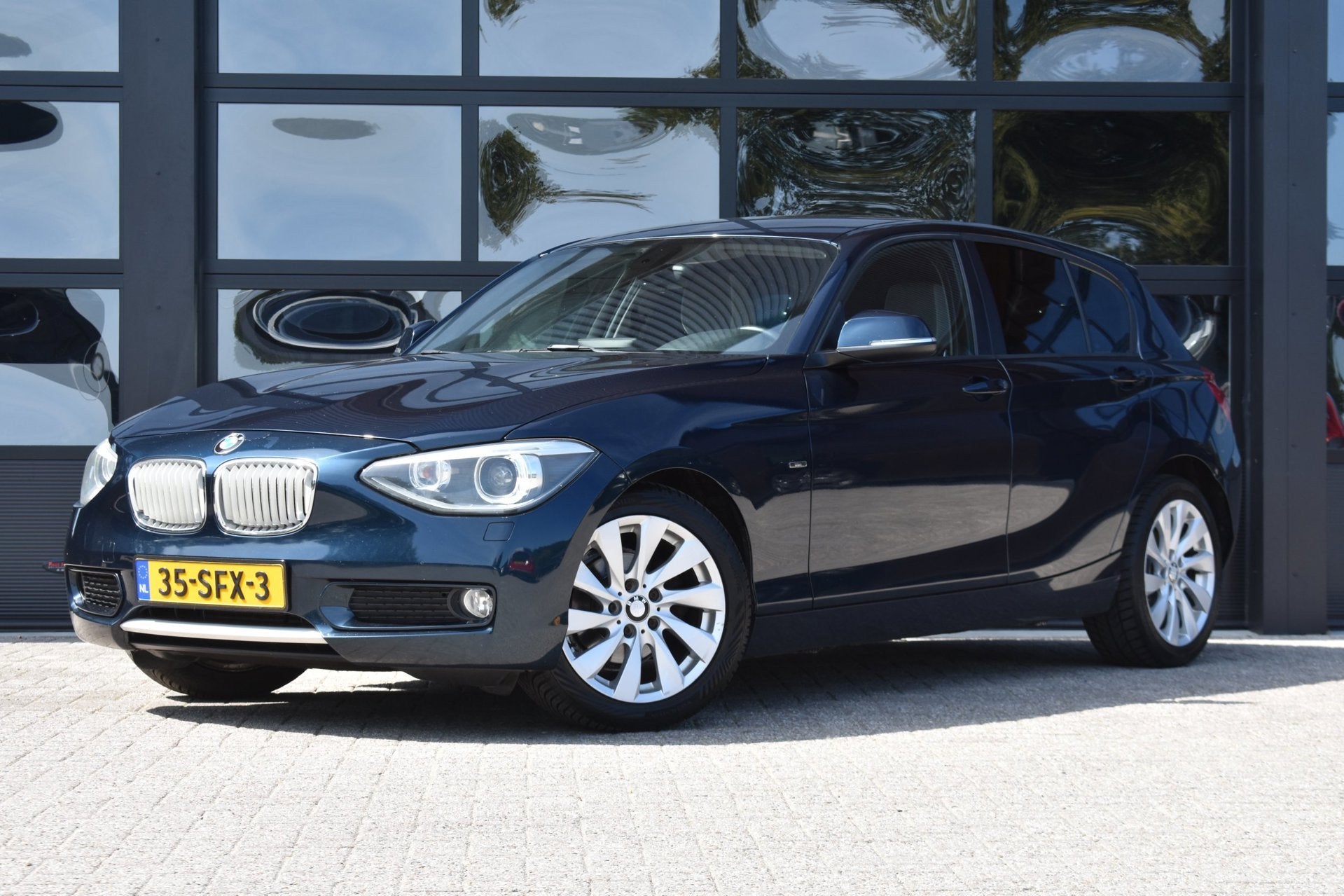 BMW 1-serie 116i Business '11 Navi Clima Cruise, Auto's, 1-Serie, Euro 5, Gebruikt, 4 cilinders