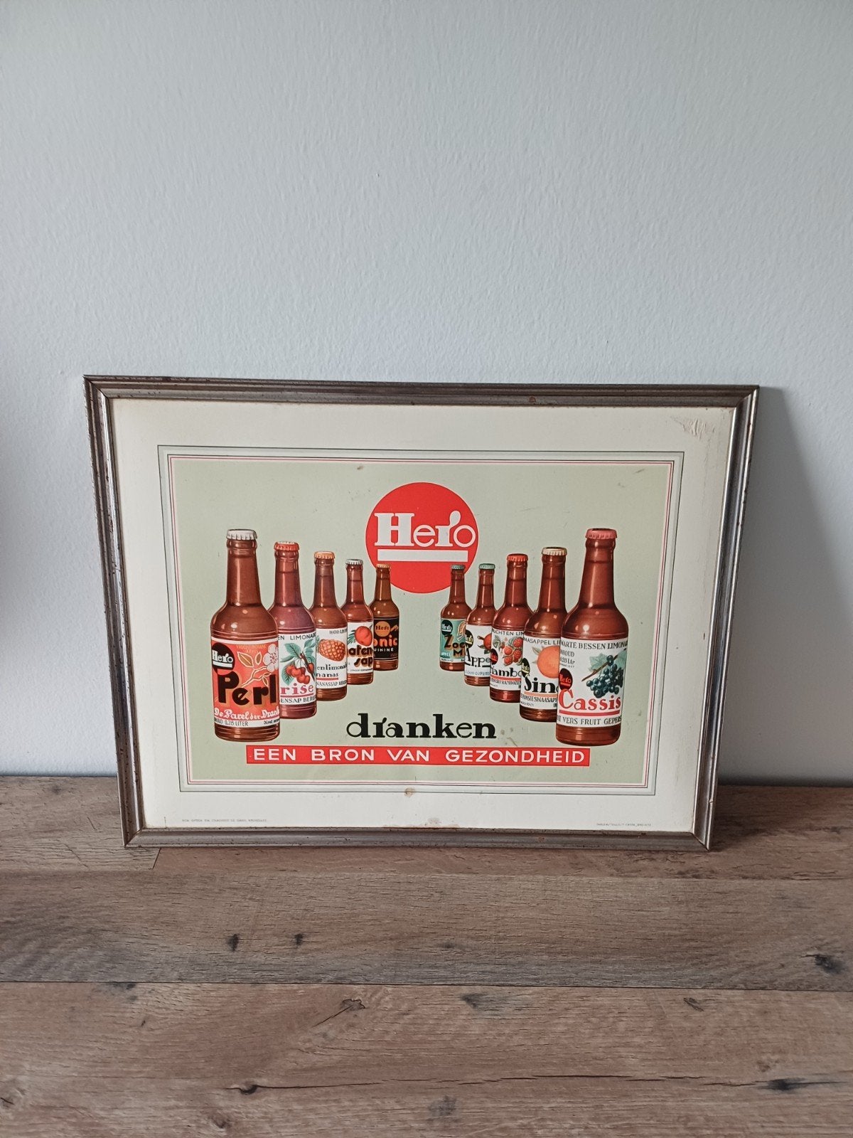 Vintage Hero Dranken Reclamebord - Een Bron van Gezondheid, Ophalen of Verzenden, Gebruikt, Reclamebord