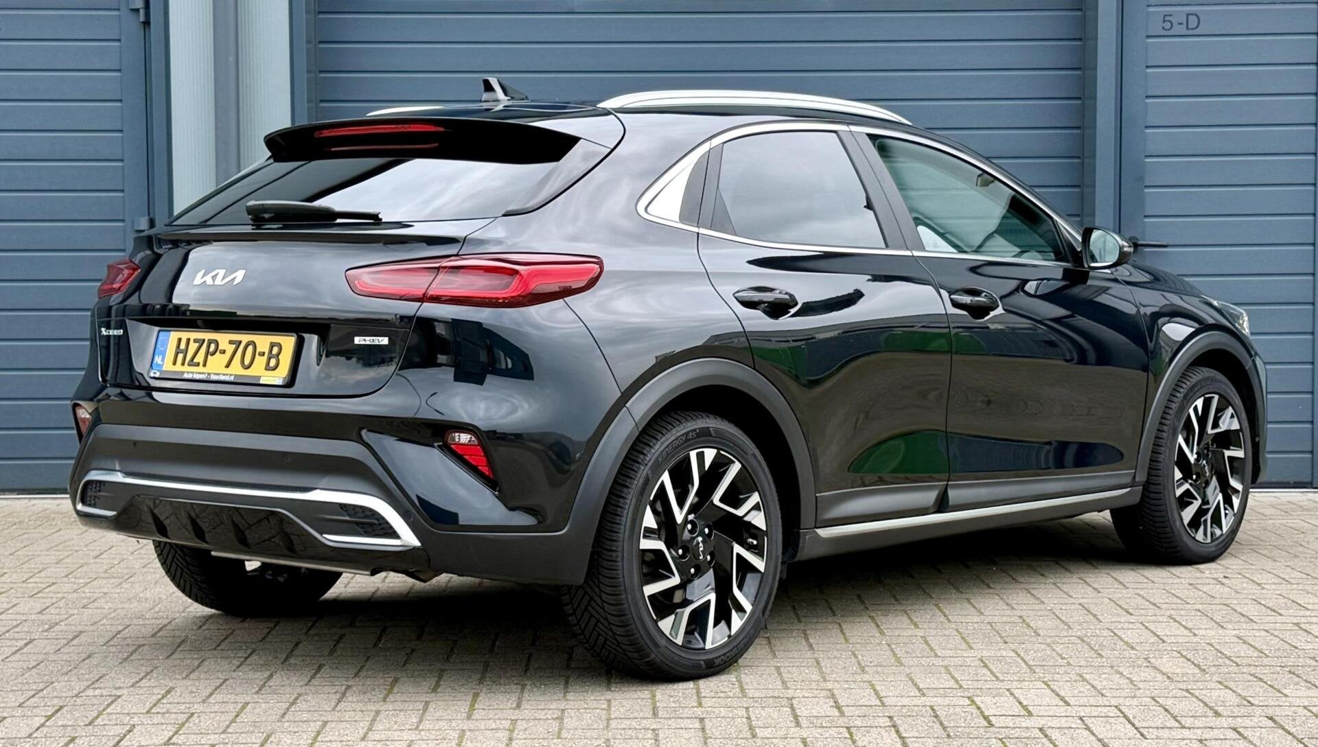 Kia XCeed 1.6 GDi PHEV 140pk DynamicPlusLine | Plug In Hybri, Auto's, Gebruikt, Leder en Stof, Zwart, 59 km/l