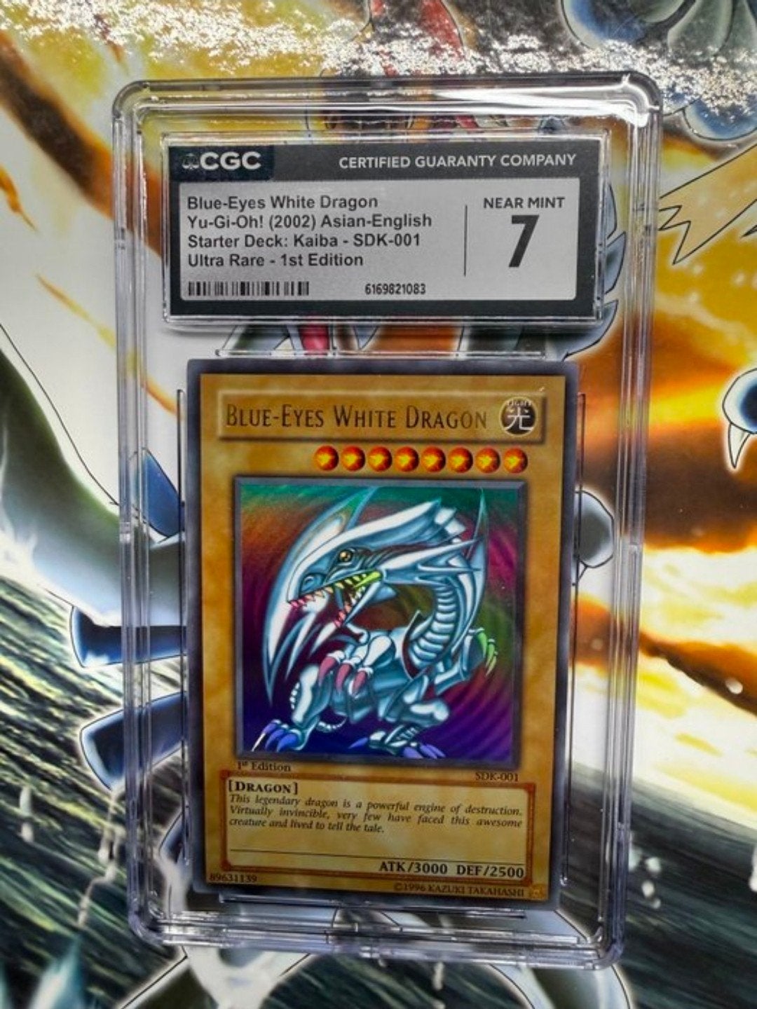Blue-Eyes White Dragon Yu-Gi-Oh! CGC 7 Near Mint, Ophalen of Verzenden, Zo goed als nieuw, Losse kaart, Foil