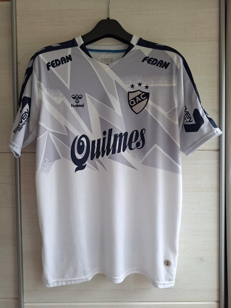 Origineel Quilmes thuisshirt 2021 (Hummel, maat L), Maat L, Ophalen of Verzenden, Zo goed als nieuw, Shirt