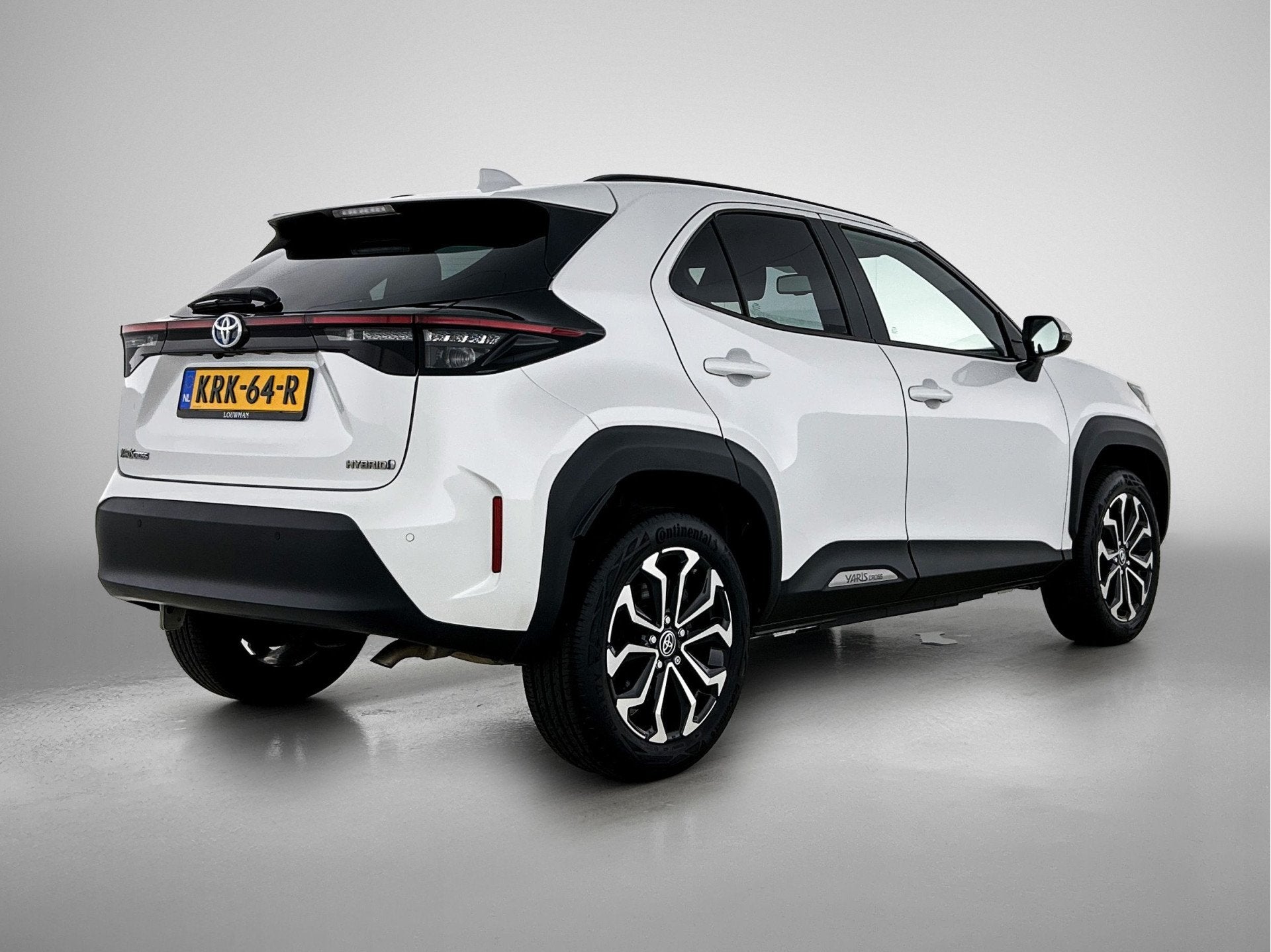 Toyota Yaris Cross 1.5 Hybrid Dynamic Limited + | Dealer Ond, Auto's, 12 maanden, Stof, Gebruikt, Wit