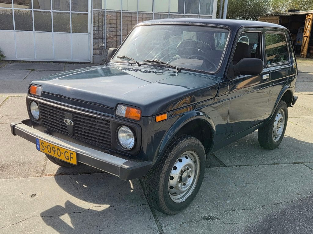 Lada Niva 1.7 I 4WD 2012 Blauw, Auto's, 83 pk, Stof, Niva, 11 km/l