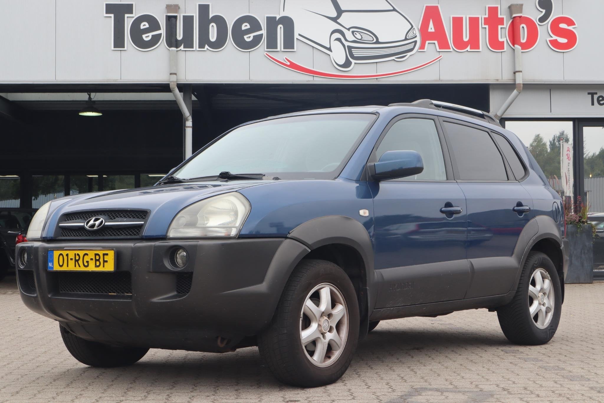 Hyundai Tucson 2.0i Dynamic | Trekhaak | Airco | Cruise cont, Stof, Gebruikt, 4 cilinders, Blauw