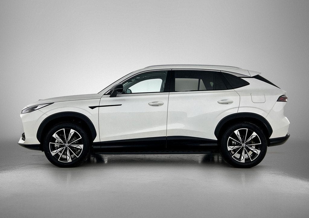MG HS 1.5 Luxury Aut. Luxury | Electrische Stoelen | MG Pilo, Auto's, MG, 12 maanden, Stof, 4 cilinders, Plug-in hybride