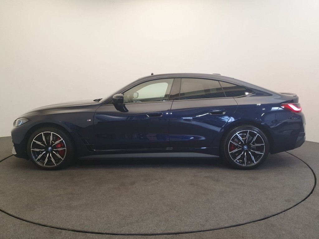 BMW i4 eDrive40 M Sportpakket Pro Pano, Head up, Trekhaak, Auto's, BMW, 12 maanden, Achterwielaandrijving, Gebruikt, 590 km