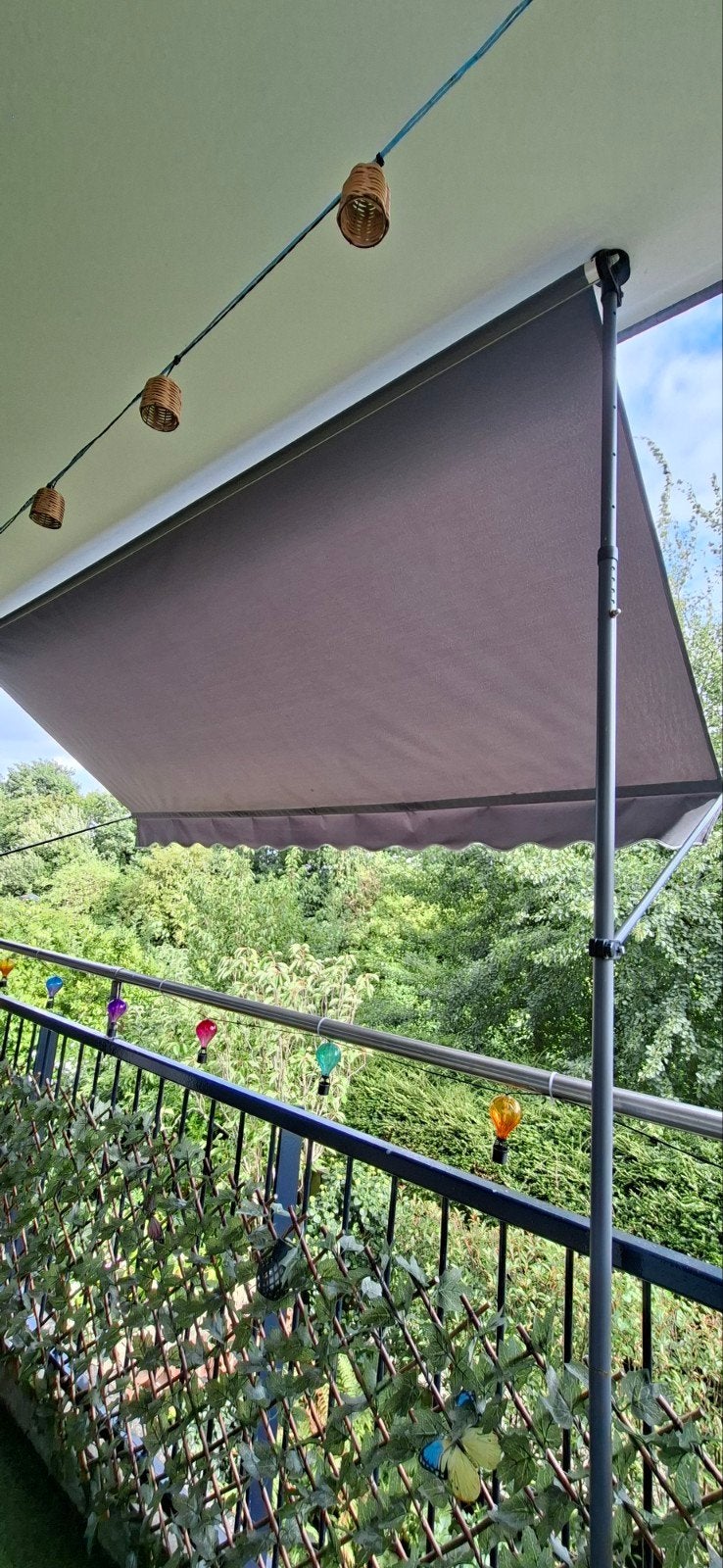 Zonnescherm/Zonneluifel, Ophalen, Knikarmscherm