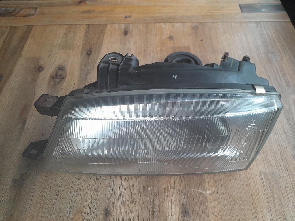 KOPLAMP - LINKS - SUZUKI BALENO - Bouwjaar: 1995 > 2002, Auto-onderdelen, Verzenden, Gebruikt, Suzuki