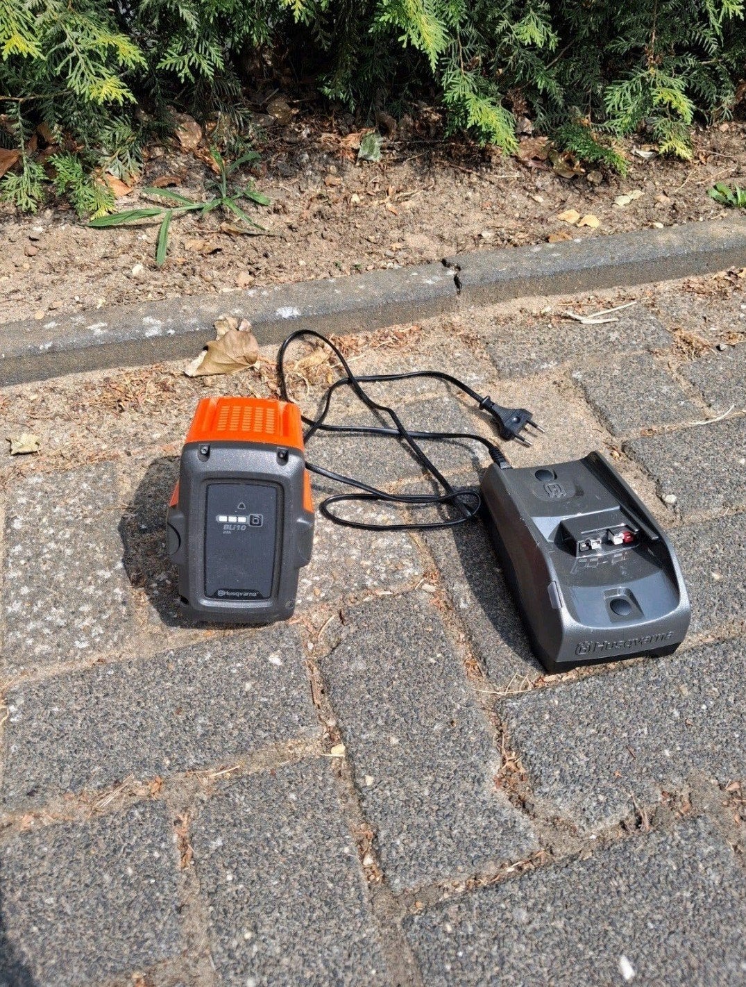 husqvarna accu en oplader, Ophalen
