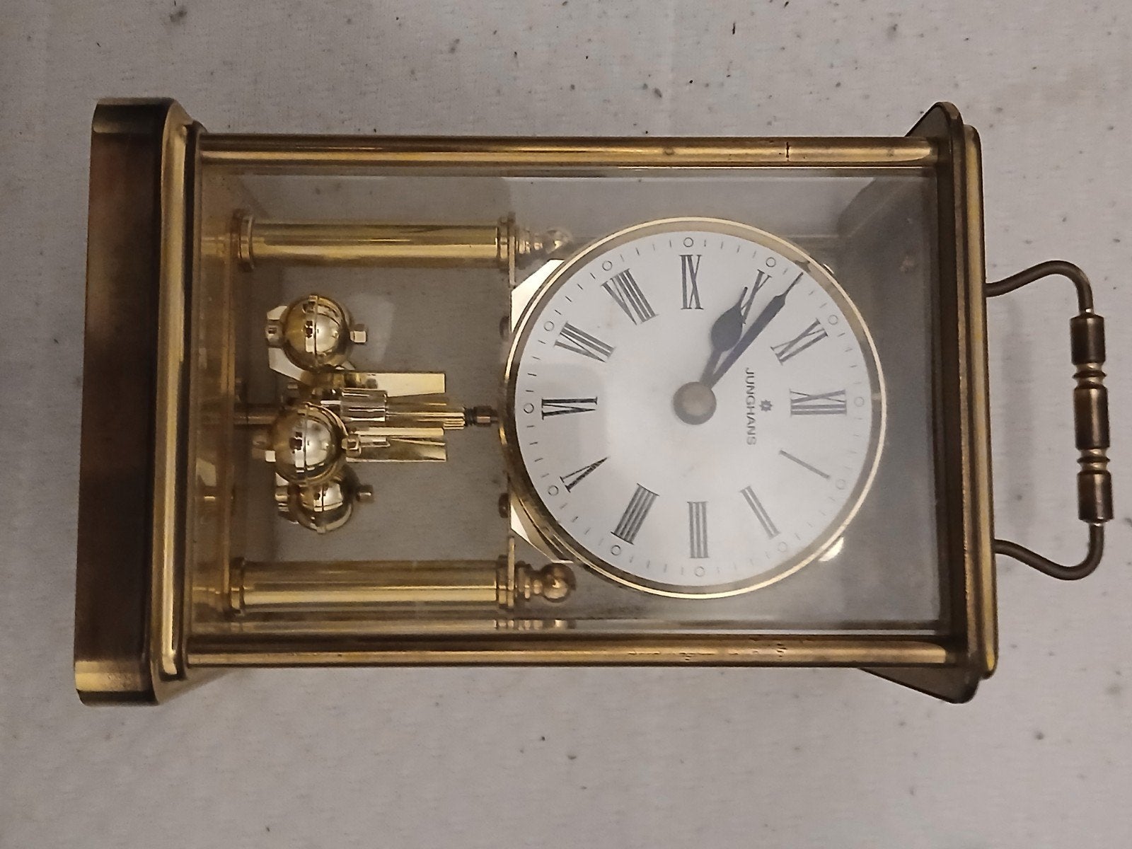 Junghans Quartz Tafelklok met Draaiende Pendel, Antiek en Kunst, Ophalen of Verzenden