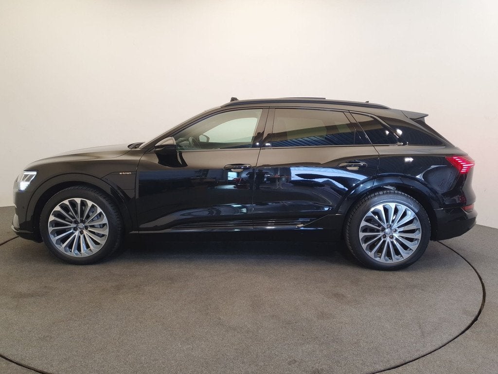 Audi e-tron 55 quattro S-Line 95 kWh Trekhaak, Pano, RS-stoe, Auto's, Audi, Automaat, Zwart, 95 kWh, Adaptive Cruise Control