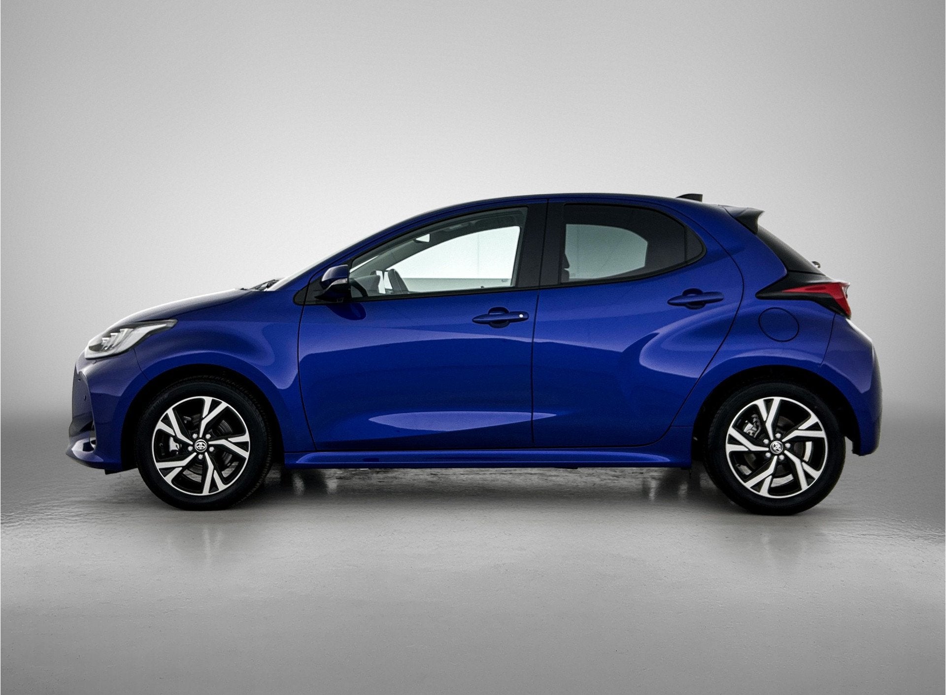 Toyota Yaris 1.5 Hybrid 115 Dynamic Comfort Pack | BTW Voert, 12 maanden, Gebruikt, Blauw, Hybride Elektrisch/Benzine