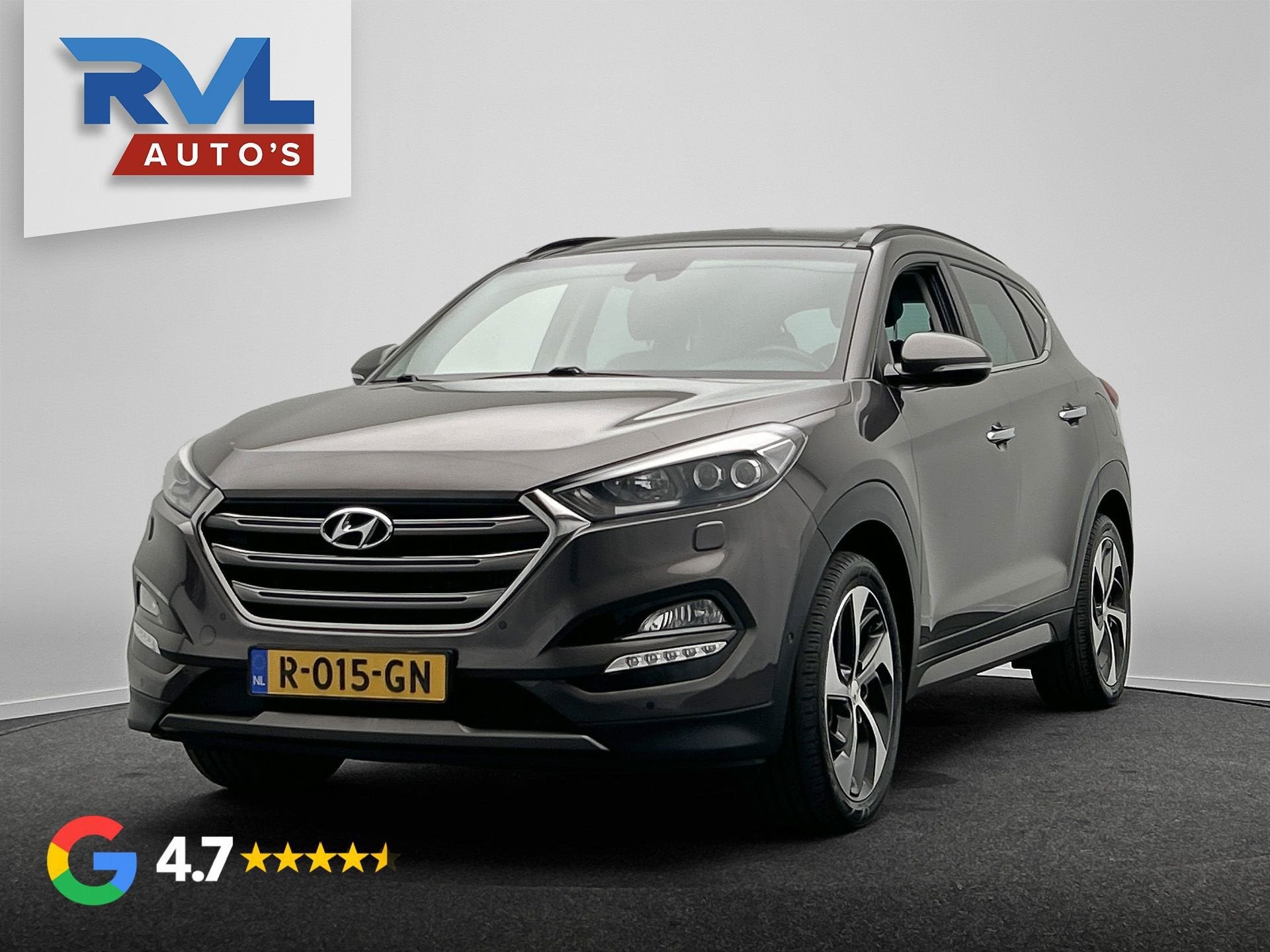 Hyundai Tucson 1.6 T-GDi Premium 4WD | Lane-Assist | Camera, Auto's, Gebruikt, 4 cilinders, Bruin, Leder
