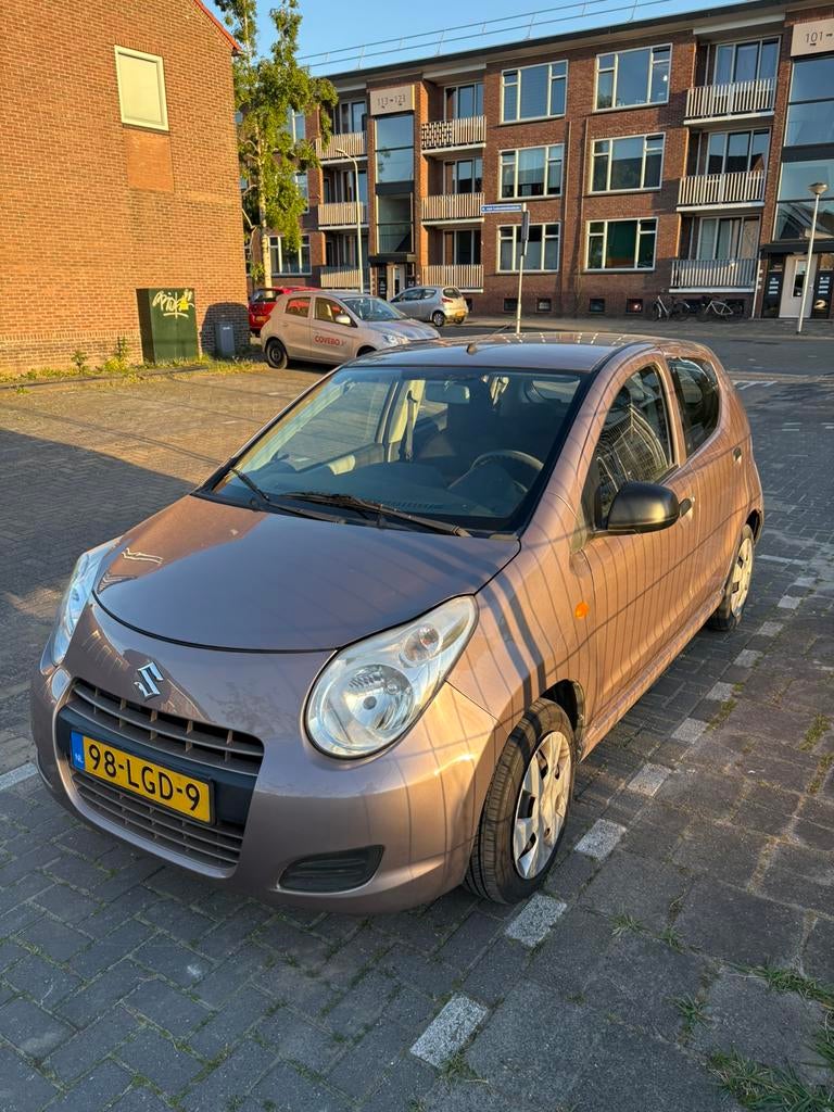 Suzuki Alto 2010, 1.0, apk 2027, Zuinig, rijdt goed, 200 kg, Bruin, 4 stoelen, Origineel Nederlands