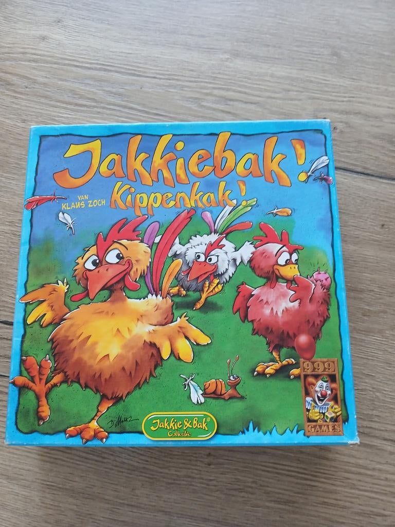 Jakkiebak! Kippenkak! Bordspel van Klaus Zoch, Drie of vier spelers, Ophalen of Verzenden, Gebruikt, 999 Games