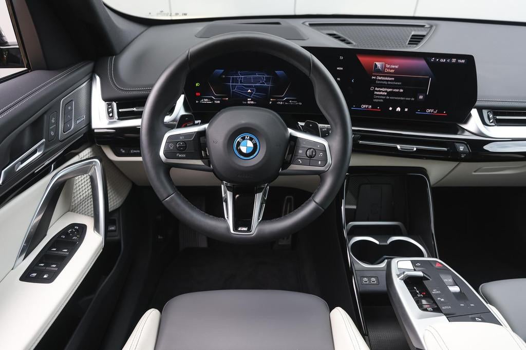 BMW X1 xDrive25e M Sport Automaat / Panoramadak / Trekhaak /, Stoelverwarming, Gebruikt, Euro 6, Zwart