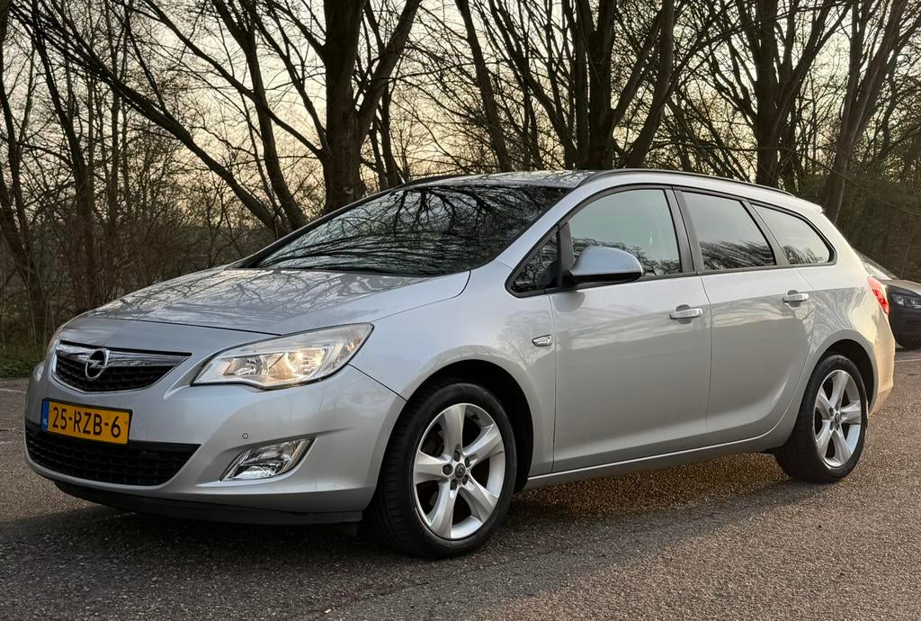 Opel Astra 1.4 Turbo 88KW Sports Tourer 2011 Grijs, Auto's, Voorwielaandrijving, Euro 5, Stof, Zwart