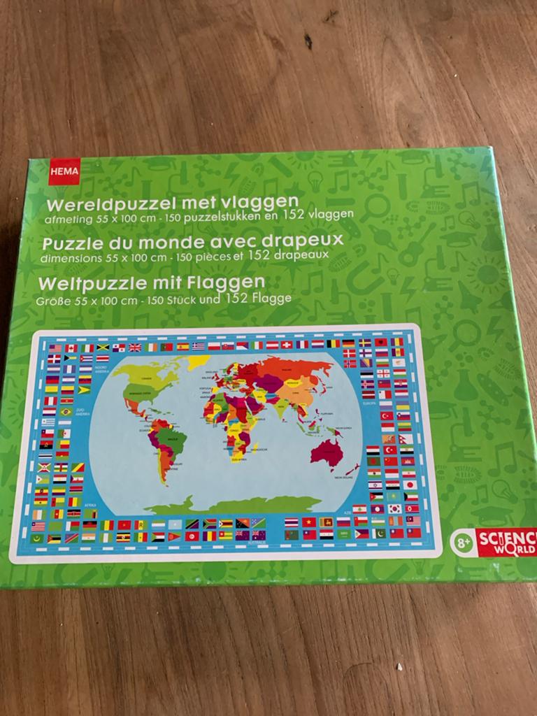 Hema Wereldpuzzel met vlaggen - 150 stukjes, Kinderen en Baby's, Speelgoed | Kinderpuzzels, Ophalen of Verzenden, Meer dan 50 stukjes