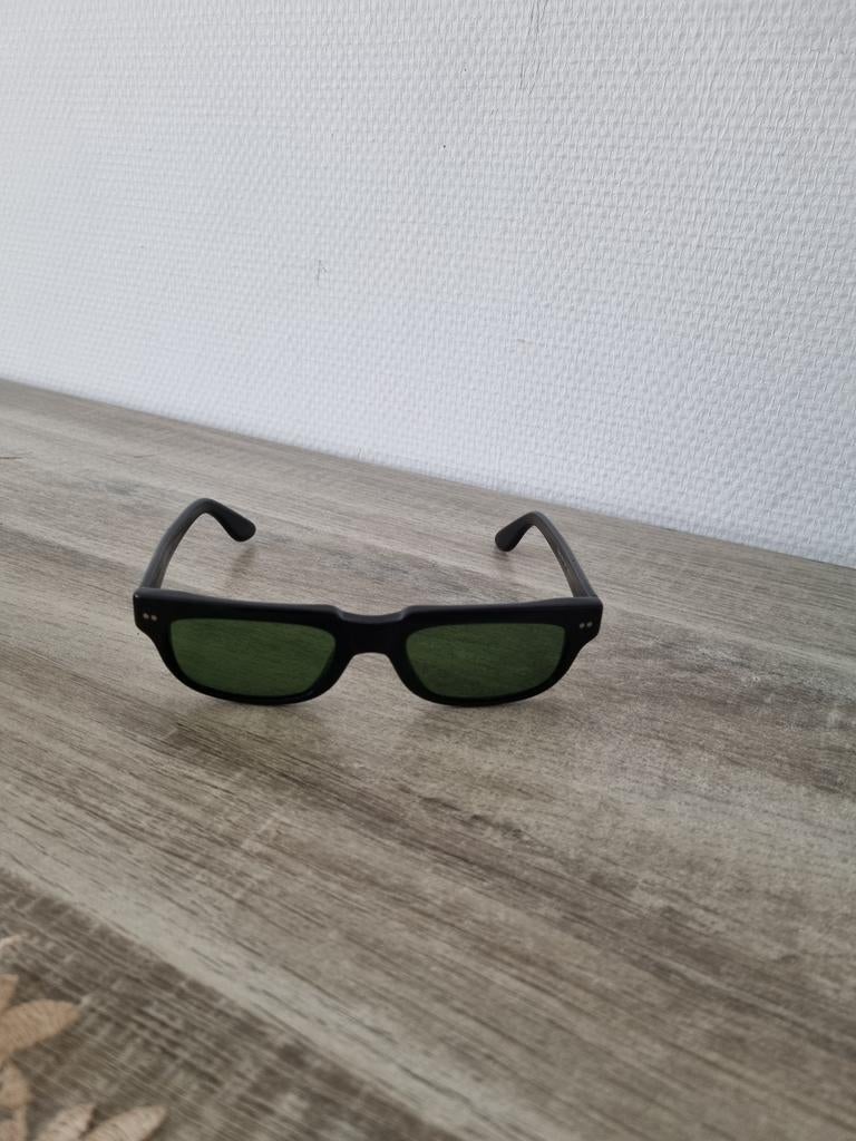 Stijlvolle Polo Zonnebril - Zwart met Groene Glazen, Ophalen of Verzenden