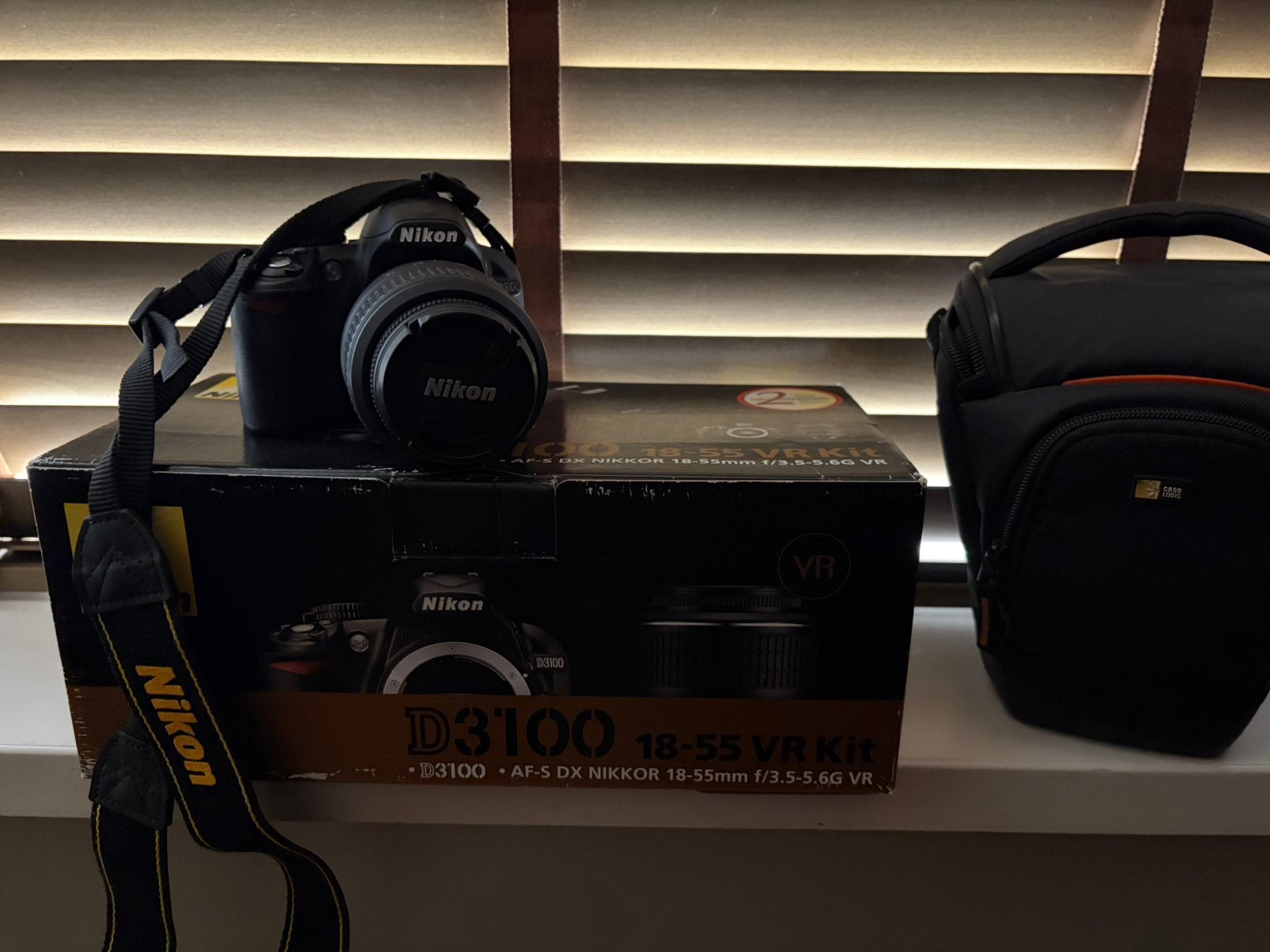 Nikon D3100 + AF-S DX NIKKOR 18-55mm, Spiegelreflex, Ophalen of Verzenden, Zo goed als nieuw, Nikon