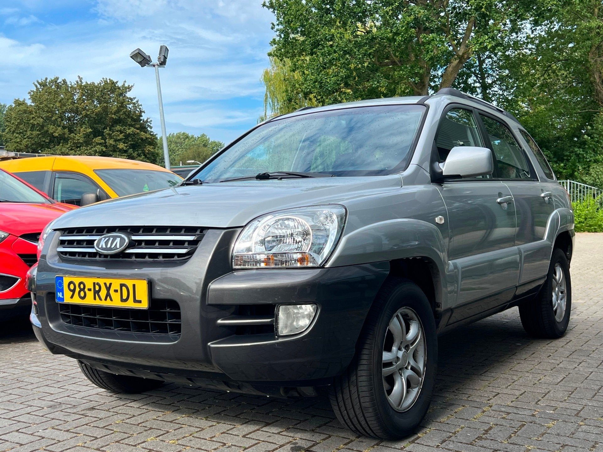 Kia Sportage 2.0 CVVT X-ecutive LPG G3 Clima / Cruise Contro, Auto's, Kia, 1486 kg, Gebruikt, Leder en Stof, Origineel Nederlands