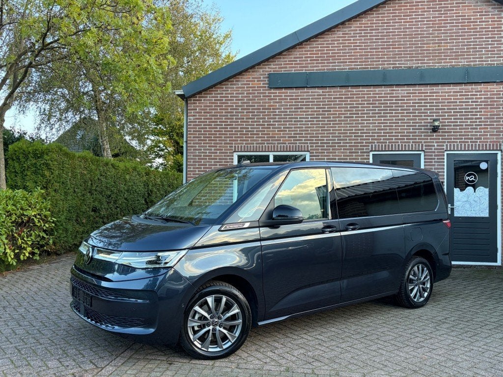 Volkswagen MULTIVAN 1.4 eHybrid L2 ENERGETIC LEER IQLIGHT PA, Auto's, Automaat, Gebruikt, Overige carrosserieën, Blauw