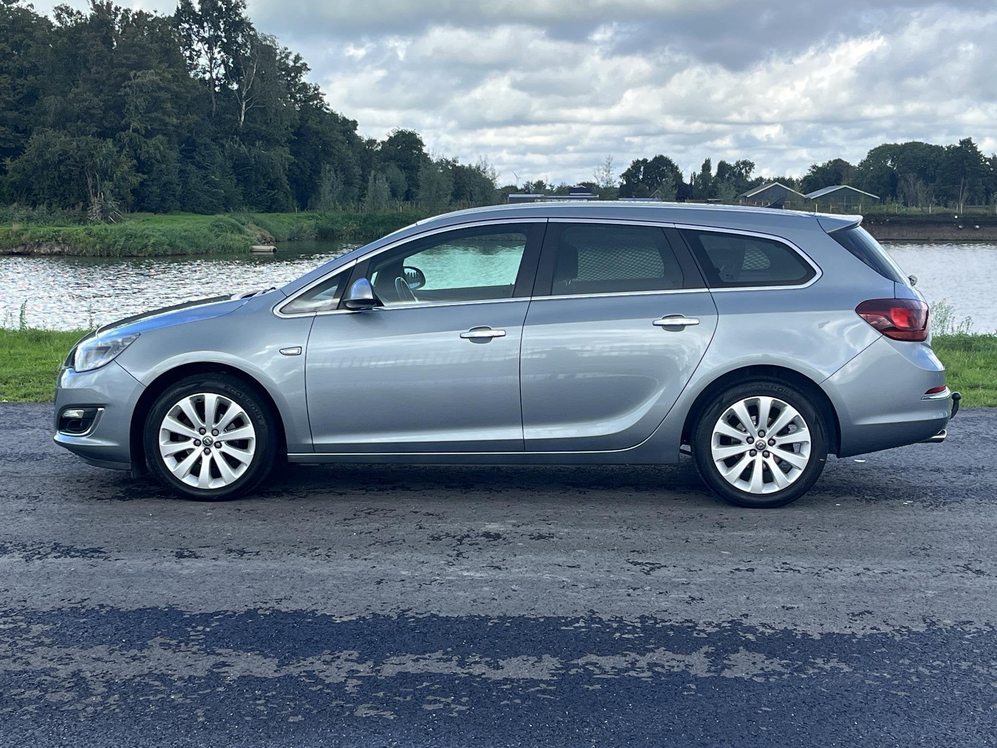 Opel Astra Sports Tourer 1.4 Turbo Sport Clima, cruise, pdc, Auto's, Voorwielaandrijving, Euro 5, Stof, Gebruikt