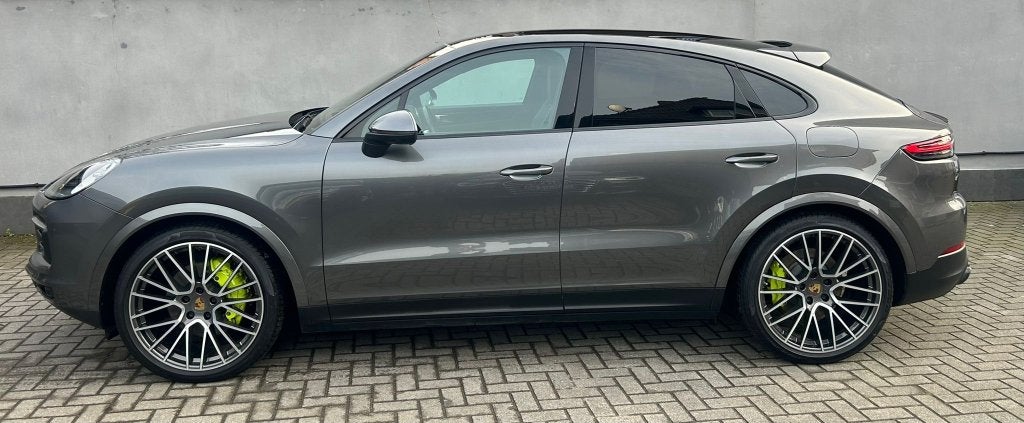 Porsche Cayenne Coupe 3.0 V6 462pk E-hybrid 2021 Grijs, Auto's, Automaat, Cayenne, Zwart, 340 pk