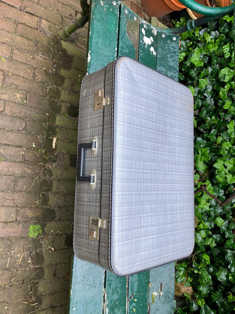 Vintage reiskoffer, Ophalen