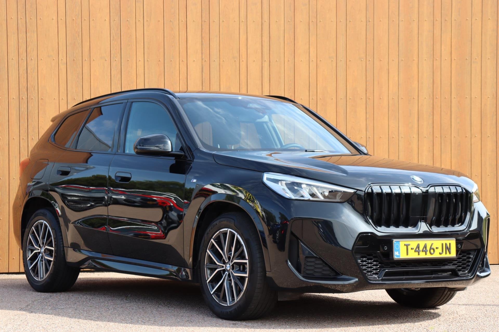 BMW X1 SDrive18i M-Sport orgNL leer/alc+verw camera el.klep, 12 maanden, 136 pk, Gebruikt, Zwart