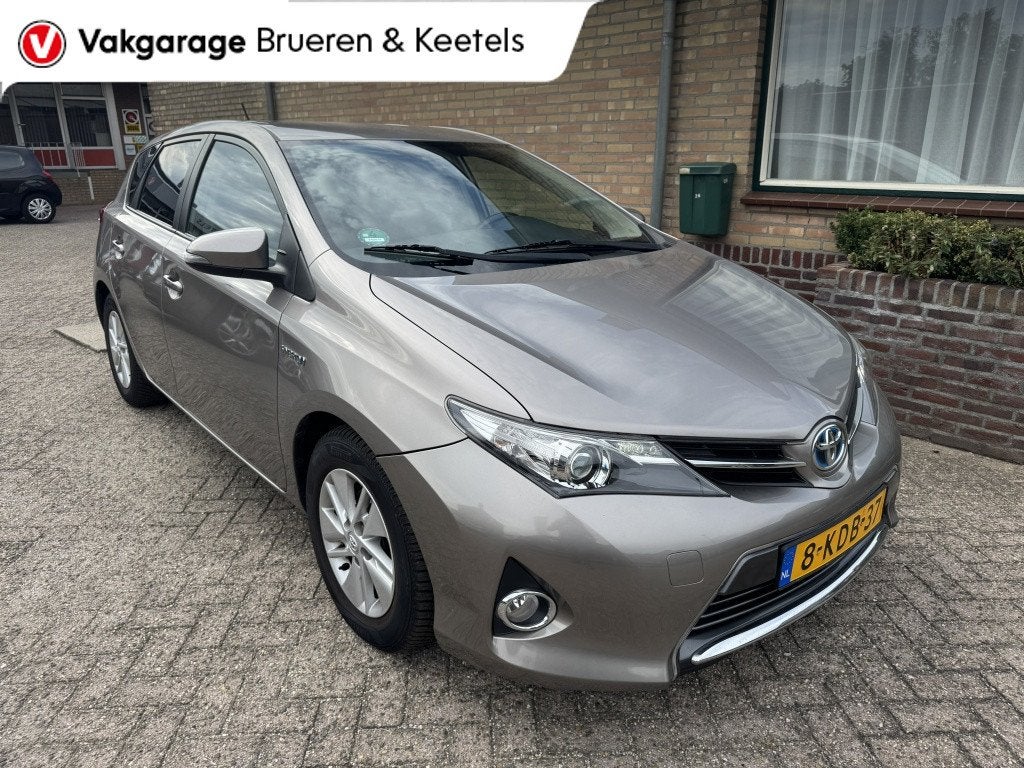 Toyota Auris 1.8 Hybrid Asp. (bj 2013, automaat), Auto's, Automaat, Euro 5, Stof, Gebruikt