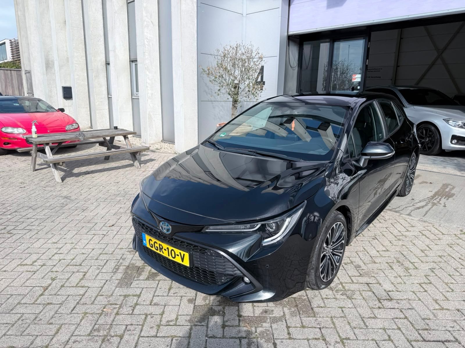Toyota Corolla 1.8 Hybrid Business Plus RIJK UITGERUST! INRU, Gebruikt, 4 cilinders, Corolla, Zwart