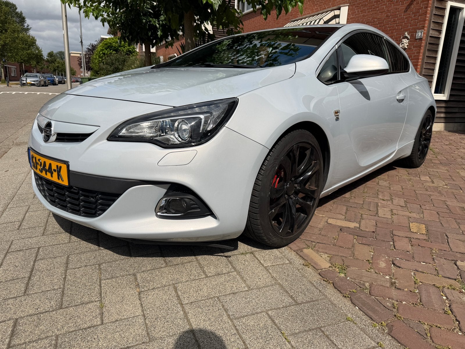 Opel Astra  GTC -OPC Line1.6 Turbo 147KW GTC 2015 Grijs, Auto's, Voorwielaandrijving, 4 cilinders, Metallic lak, Origineel Nederlands