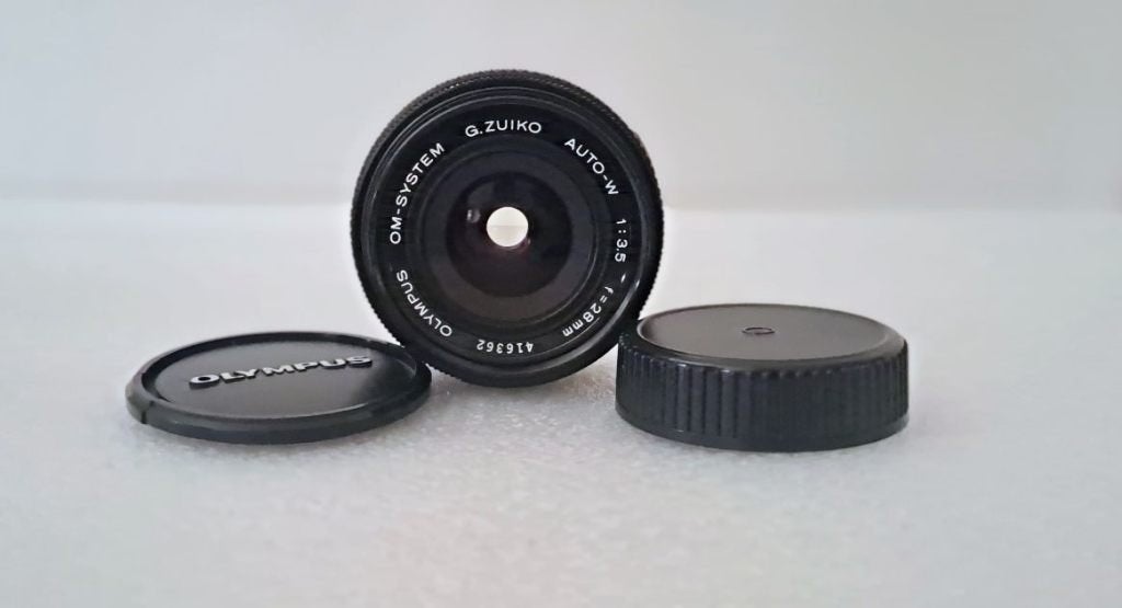 Olympus OM G. Zuiko Auto-W 1:3.5 28mm ; i.z.g.s., Ophalen of Verzenden, Spiegelreflex, Overige Merken