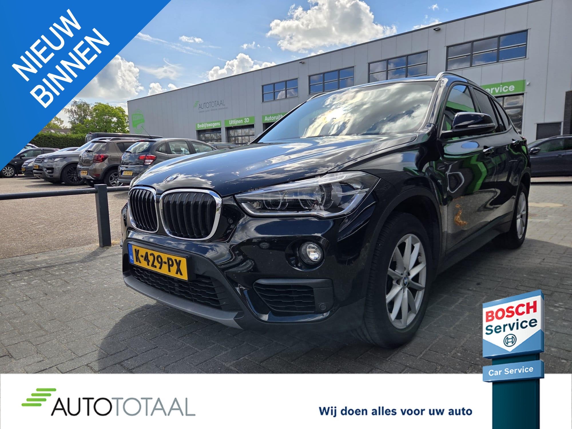 BMW X1 sDrive18i High Executive, Auto's, Stof, Gebruikt, Euro 6, Zwart