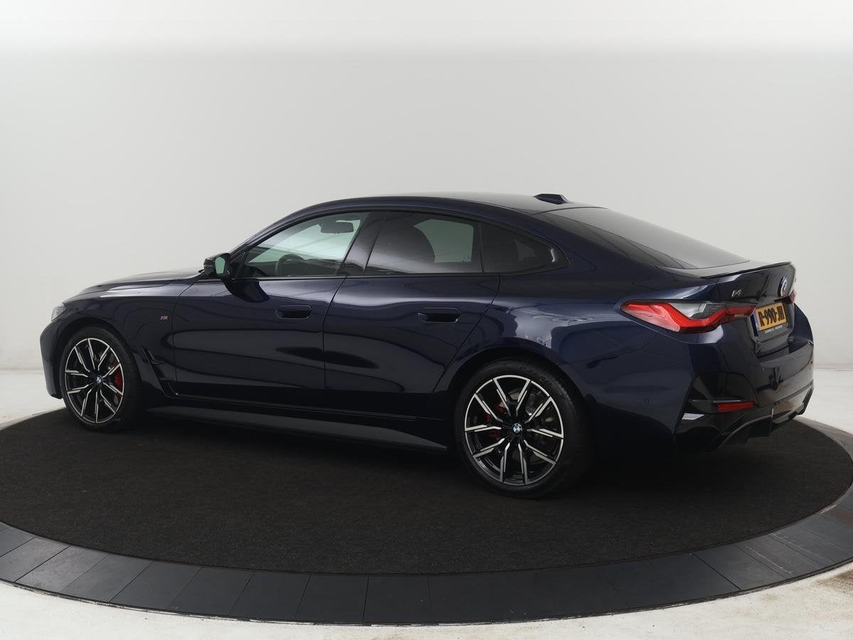 BMW i4 M50 High Executive 84 kWh | SOH 94,4% | Leder | Adapt, Auto's, Automatische klimaatregeling, 520 km, 110 €/maand, Blauw