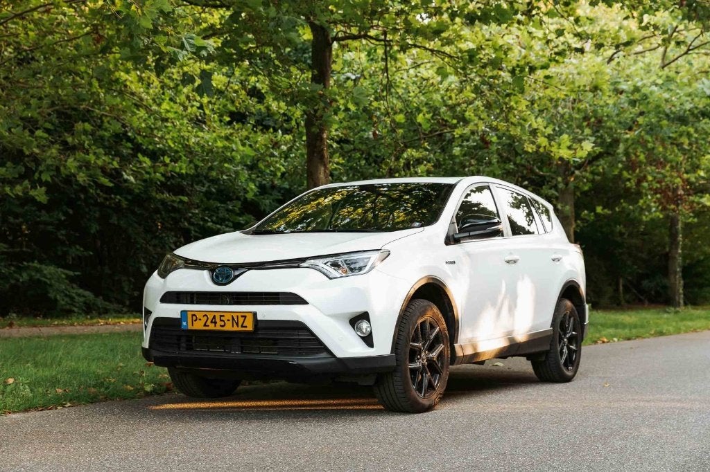 Toyota Rav4 2.5 Vvt-i Hybrid 197pk AWD Aut 2017 Wit, Auto's, Toyota, Automaat, Stof, Zwart, 1650 kg