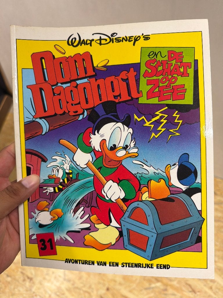 Oom Dagobert 31 - En de schat op zee, Eén stripboek, Ophalen of Verzenden, Gelezen