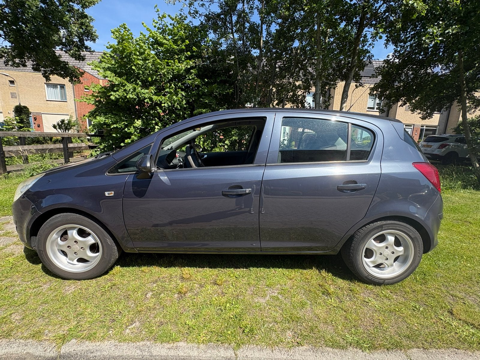 Opel Corsa 1.2 16V 5D 2009 Blauw, Voorwielaandrijving, Stof, 4 cilinders, Blauw