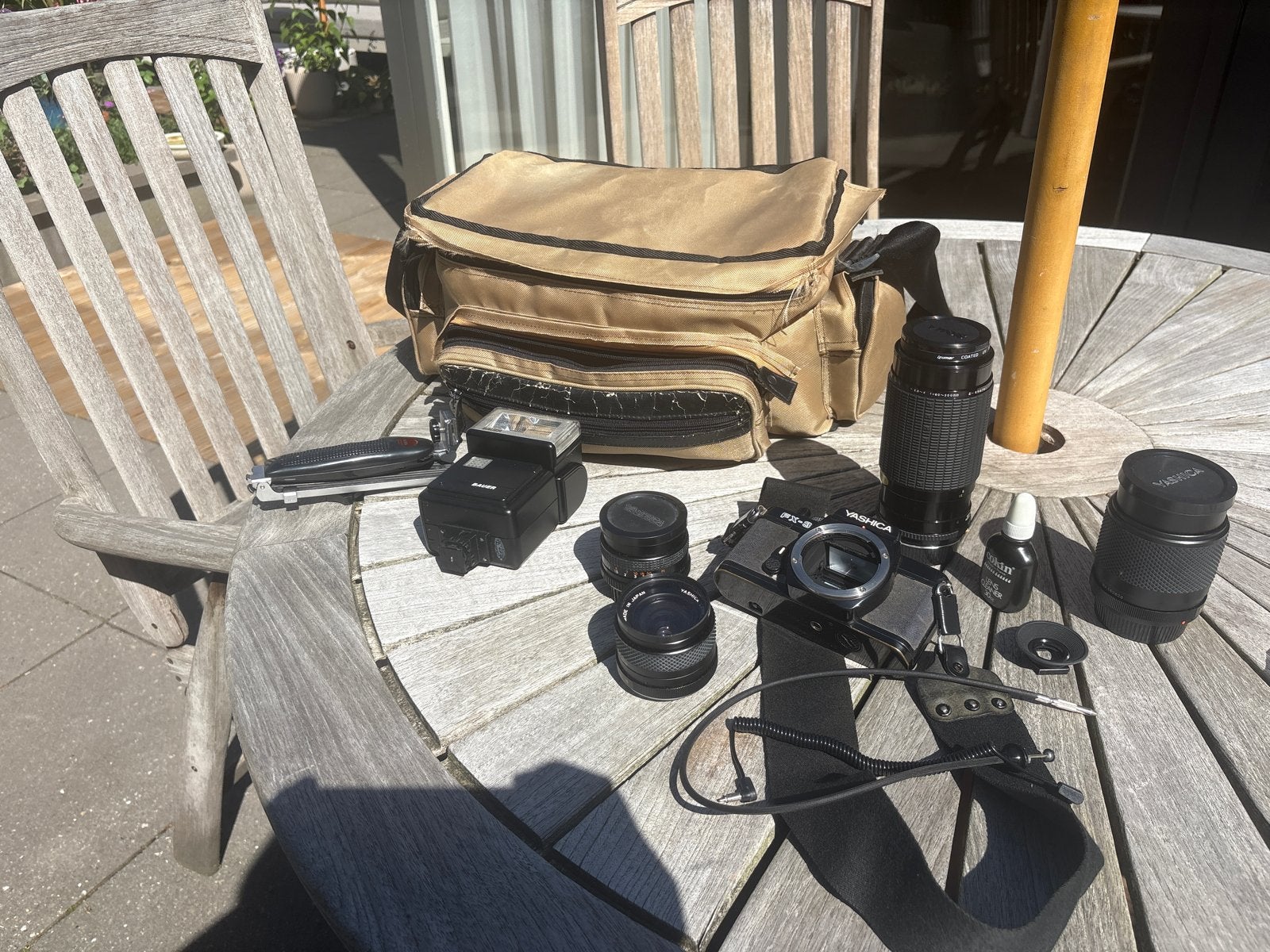 Yashica FX-3 Spiegelreflexcamera met 3 lenzen en tas, Ophalen of Verzenden, Gebruikt, Spiegelreflex, Overige Merken