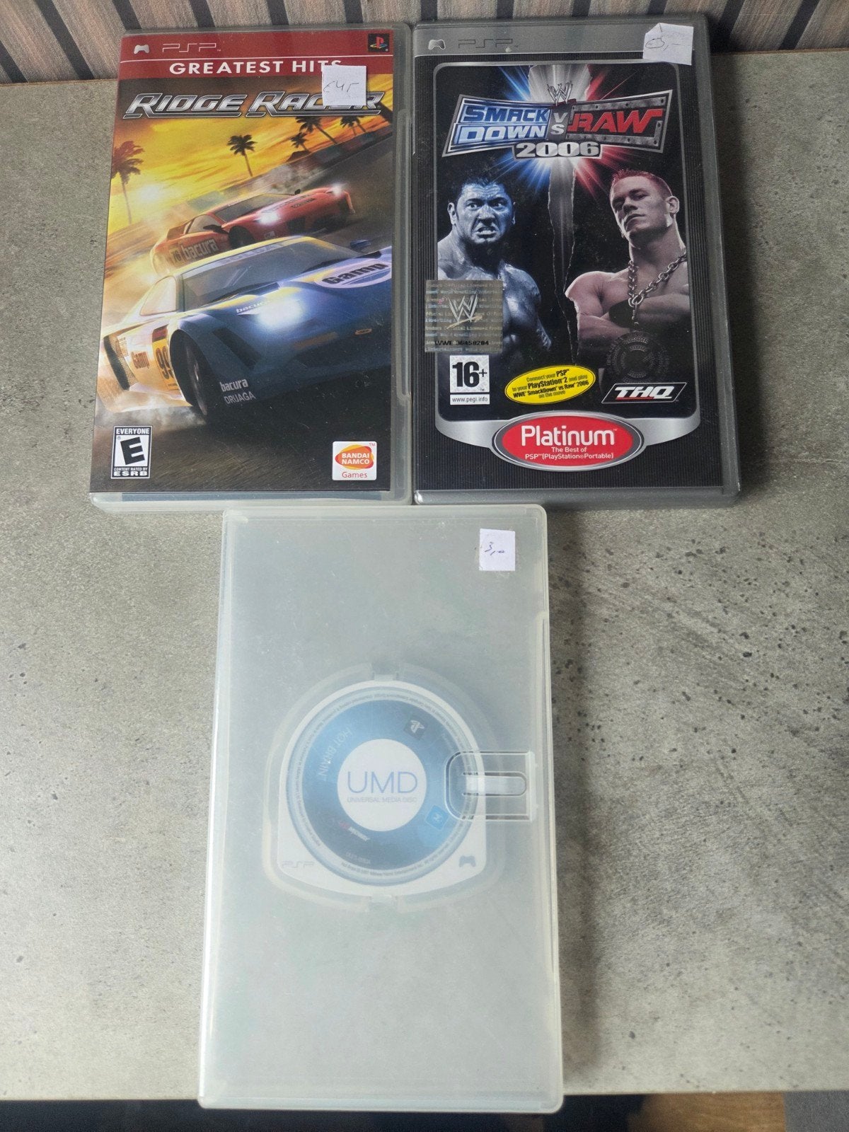PSP Games: Ridge Racer, Smackdown vs Raw 2006 + lege UMD, Gebruikt, 1 speler, Racen en Vliegen, Ophalen of Verzenden