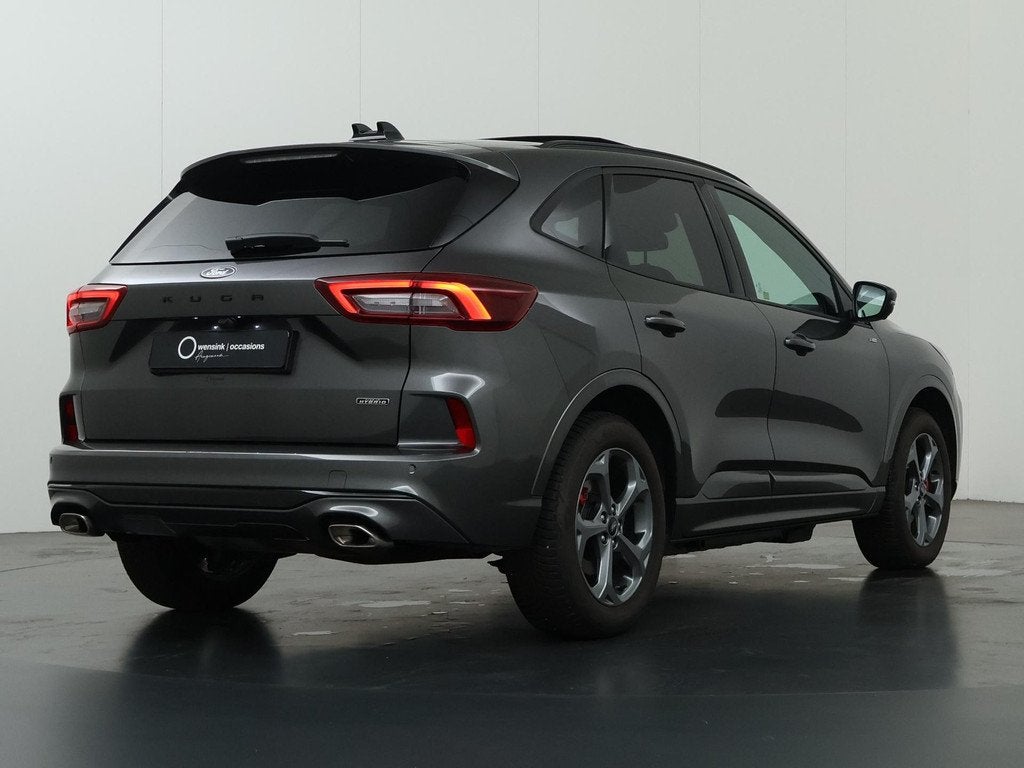 Ford Kuga 2.5 PHEV ST-Line X | Elek. Trekhaak | Panoramadak, Auto's, Ford, 14 kWh, Gebruikt, 4 cilinders, Leder en Stof