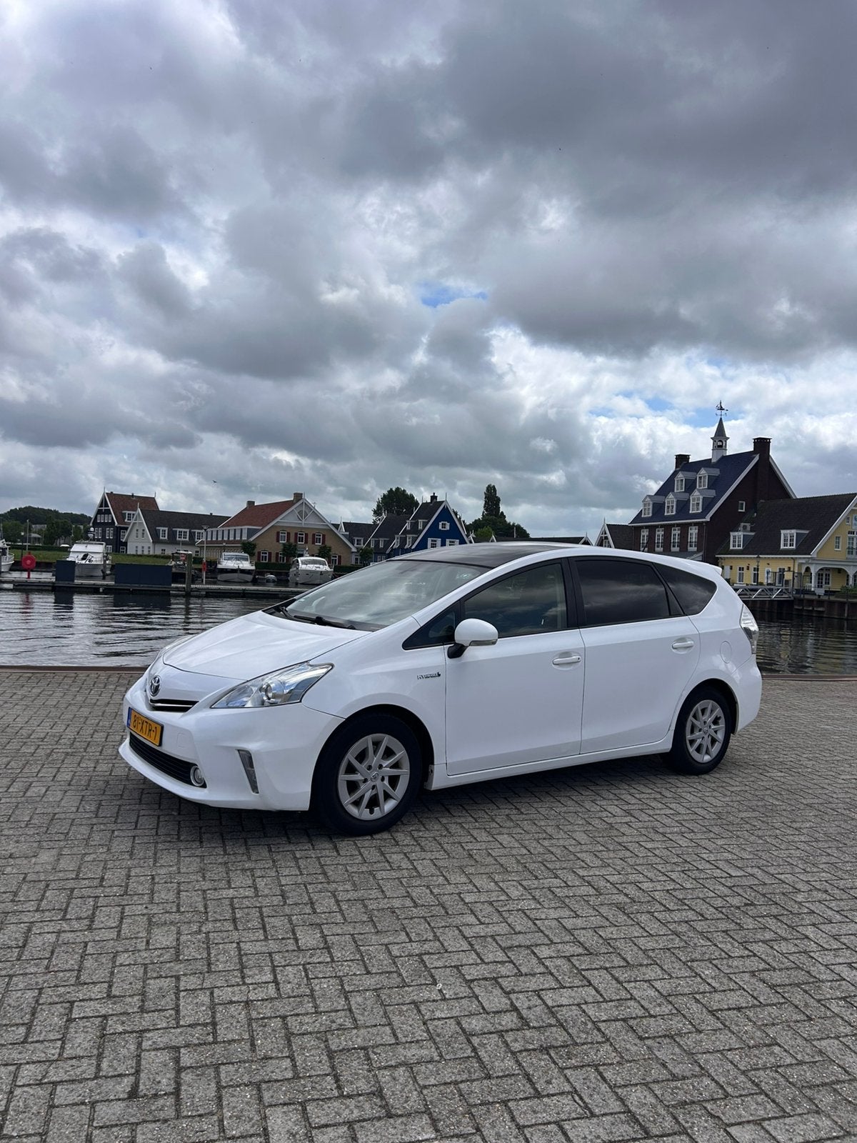 Toyota Prius Wagon 1.8 Full Hybrid 136PK Aut 96g 2012 Wit, Auto's, Toyota, 4 cilinders, 7 stoelen, Wit, 84 €/maand