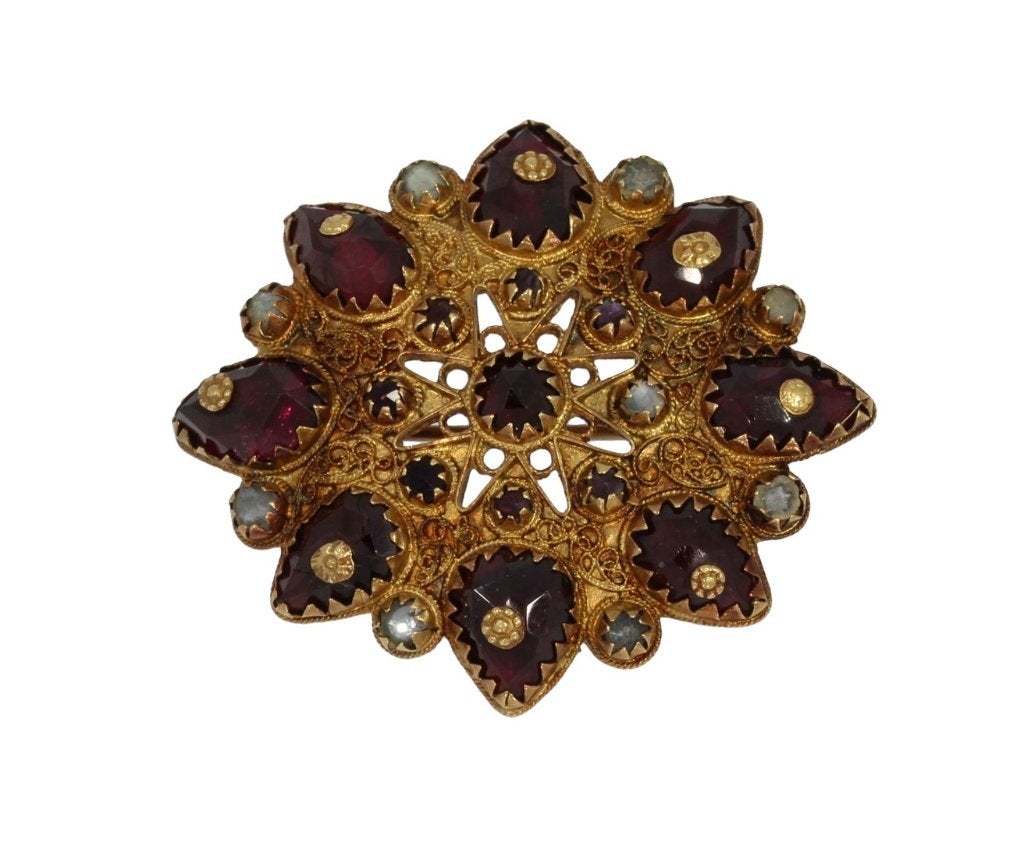 Granaat 14k gouden ster broche antiek Friesland certificaat, Ophalen of Verzenden, Goud, Broche, Met edelsteen